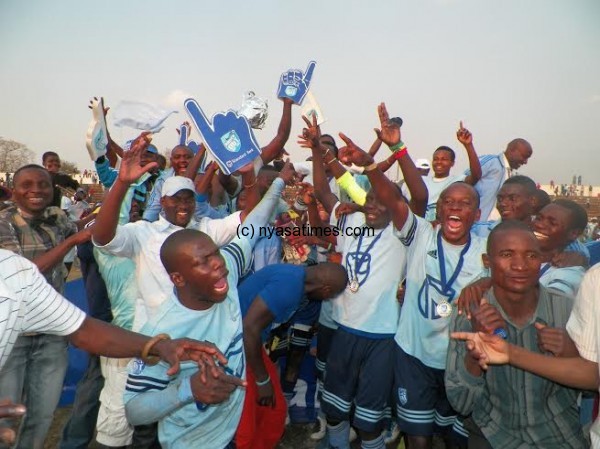 Celebration time for the new champs..-Photo by Alex Mwezalumo, Nyasa Times