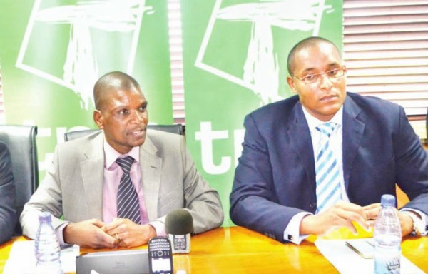 TNM's Makata (L) and Sulom  vuce president Daudi Suleman: First team to hit 300,000 SMS to get a once- off K1.5 m reward.