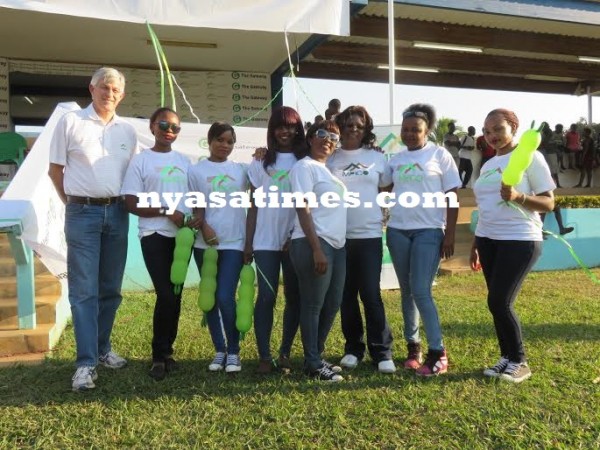 Cheer ladies pose with sponsors Mpico