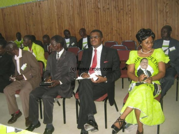 Chibambo sitting between his wife and other party officails