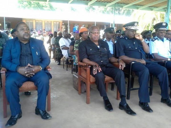 Chibingu, Muluzi and officiers  in sombre mood at the funeral