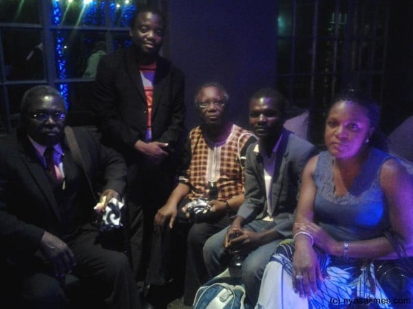 Chikoti (standing), posing with from left to right James Ng'ombe, Jack Mapanje, Nyasa Times' Pius Nyondo and Ellen Banda-Aaku