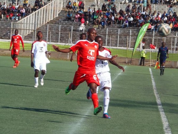 Chiku Kanyenda blocking a Rangers players from the ball- Photo by Jeromy Kadewere, Nyasa Times
