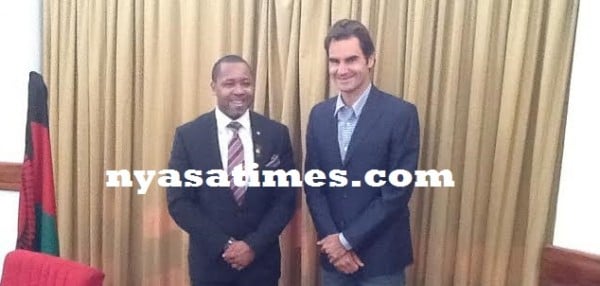 Chilima with Federer after the tennis star had paid a courtesy call