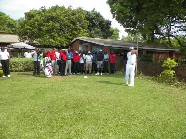 Chilima takes a swing after teeing off