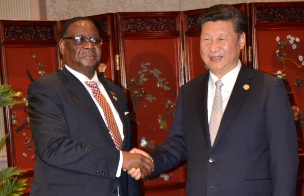 China's president Xi Jinping welcomes president Peter Mutharika to a breakfact meeting at the Michalloangelo Hotel, Johannesburg during the FOCAC summit. Pix Gospel Mwalwanda