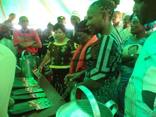 Chiumia viewing some of the farm inputs ... s project. Pic Sellah Singini (Mana).