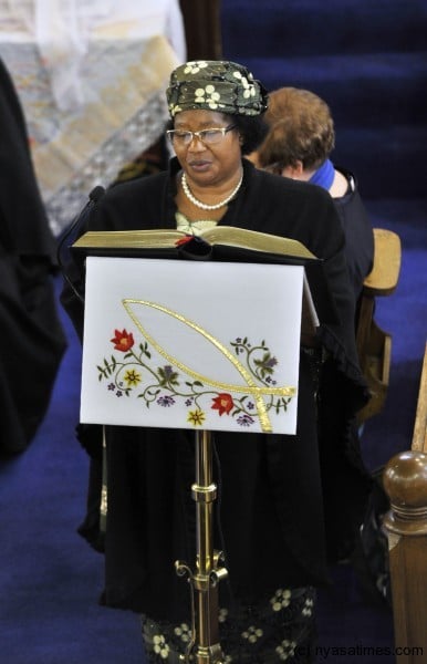 President of Malawi Dr Joyce Banda reading a passage from the bible during the Memorial Service - Explorer David Livingstone was born in Blantyre on 17th March 1813 - picture by Donald MacLeod -