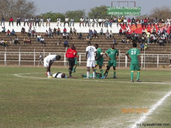 Civo's Jabulani Linje and Epac's Bright Phiri being attended to after head on collision, Pic Leonard Sharra