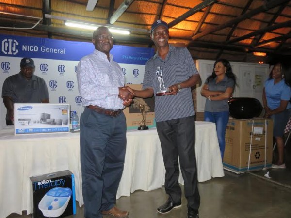 Congrats team-mate, Mwakhwawa gets his prize from Chapola