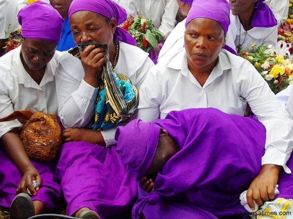 The breaved family being comforted....Photo Jeromy Kadewere