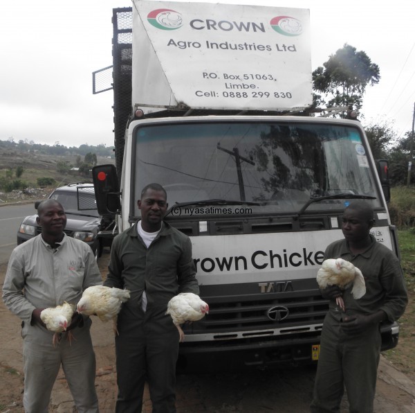 Crown Chickens workers pose with the chickens