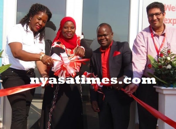 Cutting-of-the-ribbon-to-open-the-...-shop....Photo-Jeromy-Kadewer