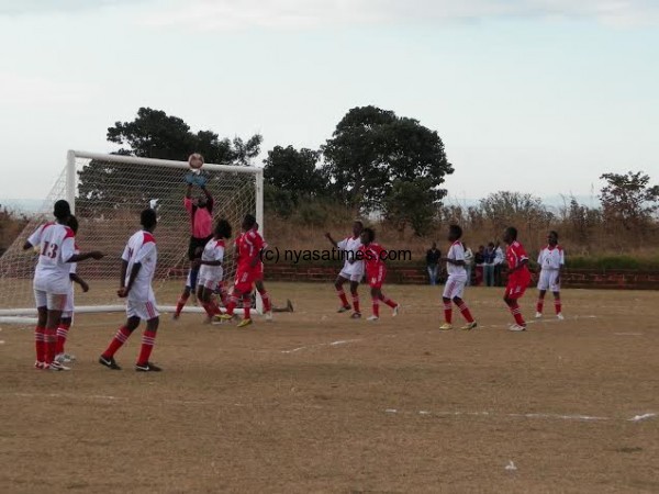 DD Sunshine goalie Patricia Nyaka makes a save.