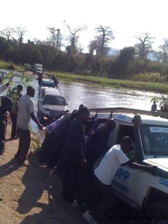 Mutharika braved the waters by taking his motorcade over the river. His vehicles on the motorcade had to spend almost an hour to cross the river.