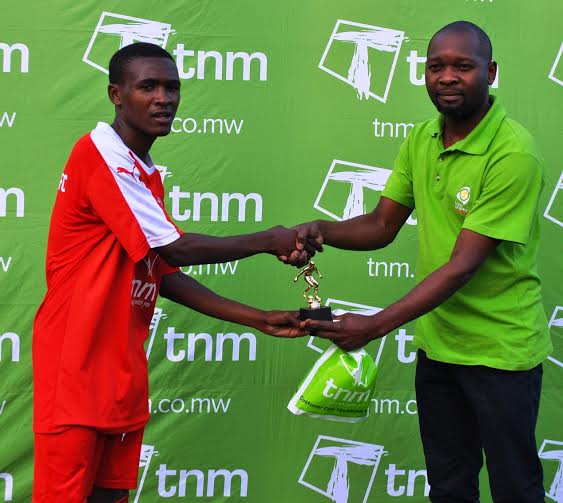 Dalitso Sailesi receiving his man of the match award....Photo Jeromy Kadewere