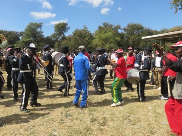 Dancing time- Malawi Police Band is joined by Massa officials.