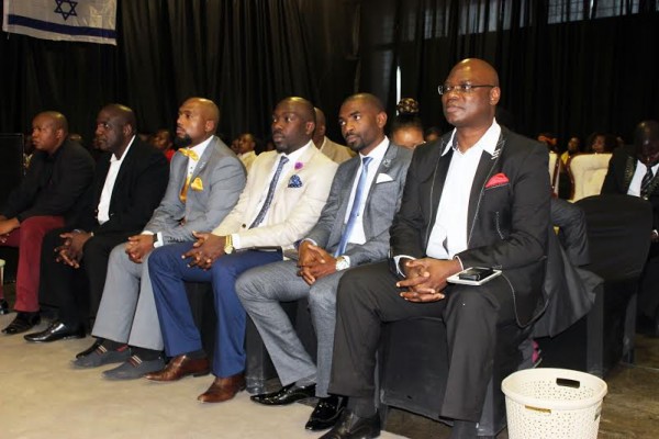 Members congregating during Diplomatic Service including Chri Daza (first from right) at Bushiri's church