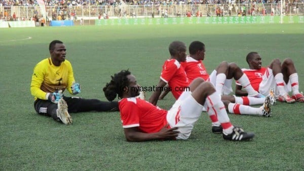 Dejected Bullets players after penalties.-Photo by Jeromy Kadewere, Nyasa Times