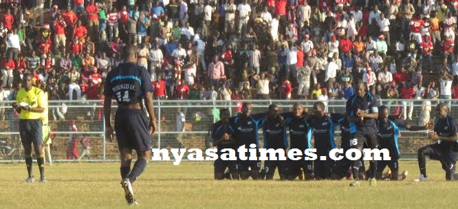 Dejected-Malidadi walks after missing the decisive penalty, Pic Alex Mwazalumo