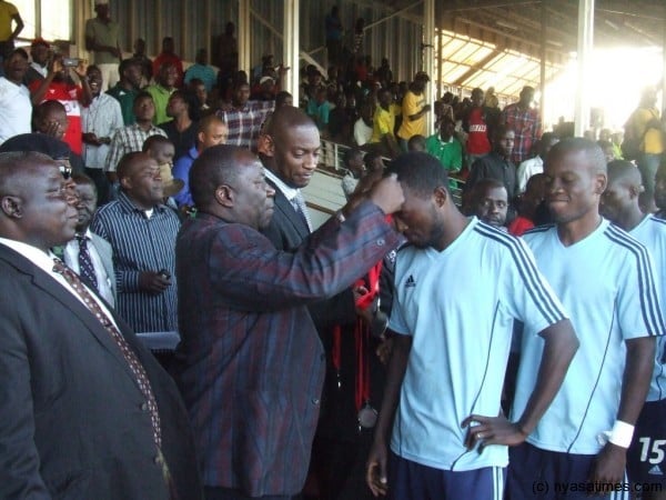 Dejected Silver players receiving their medals  Photo by Elijah Phimbi, Nyasa Times