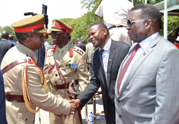 General Ignasio Maulana and Foreign Affairs Minister George Chaponda and Deputy Minister of Defence Malisoni Ndau (C) is met by Commander of Malawi Defence Force C) Stanley Makuti