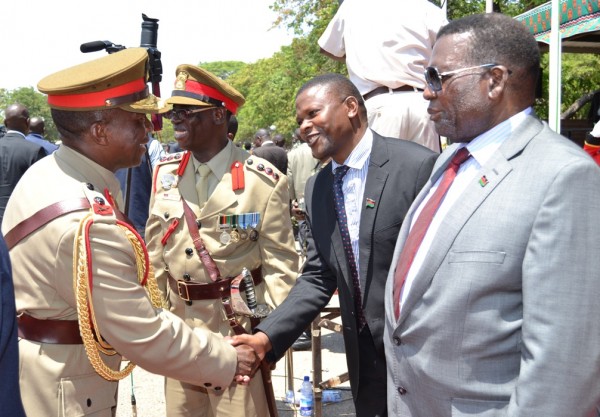 General Ignasio Maulana and Foreign Affairs Minister George Chaponda and Deputy Minister of Defence Malisoni Ndau (C) is met by Commander of Malawi Defence Force C) Stanley Makuti