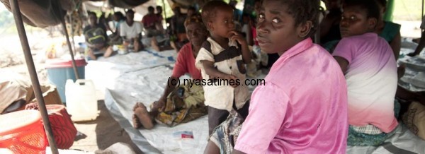 Displaced women and children at the Sekeni II Camp for flood victims in Chikhwawa District, Malaw