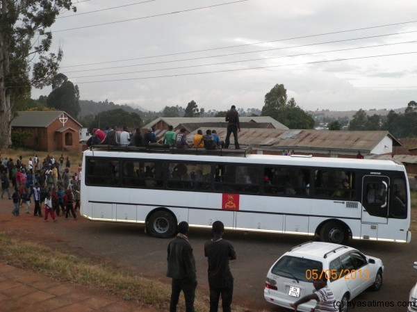 Dedza fans ride on KB bus.-Photo /Nyasa Times