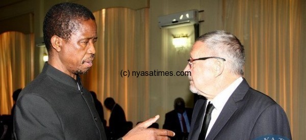 President Lungu (left) sacks Scott