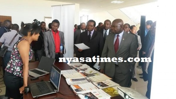Education Minister Emmanuel Fabiano listens to Techno Brain respresentative during Must open day ¤