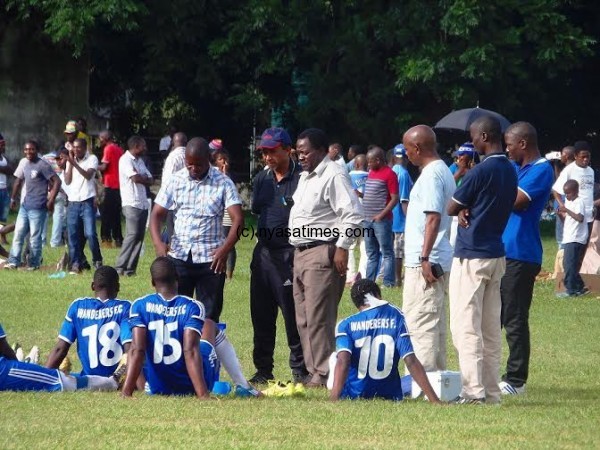 Coach Elijah-Kananji-and-his-players-on-recess-time....Photo-Jeromy-Kadewere