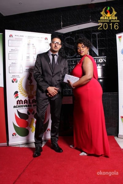 Elizabeth Mtimbusya with singer Kaz