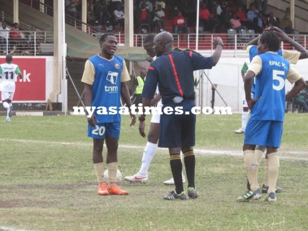 Epac players complain as the ref awards Moyale a penalty.