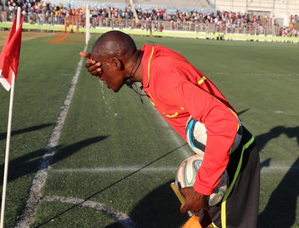 Even the match official faced the tear gas torture -.Photo Jeromy Kadewere