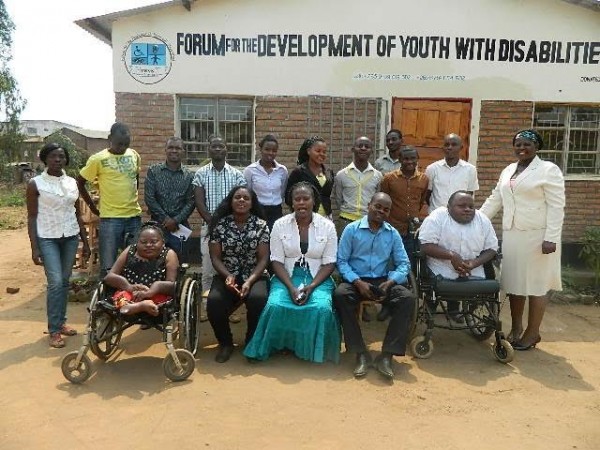 FDYD officials posing with media practitioners from diffrent media houses