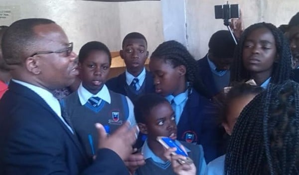 Felix Jumbe Interacting with students
