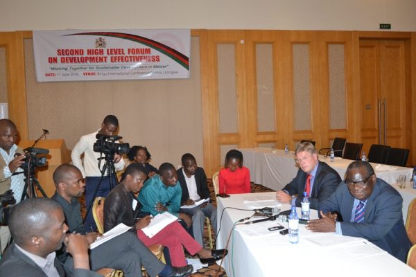 Finance Minister Goodal Gondwe with German Ambassador, Dr. Peter Woeste address the Press after the Second High Level Forum Meeting on Development Effectiveness at BICC in Lilongwe-(c) Abel Ikiloni, Mana