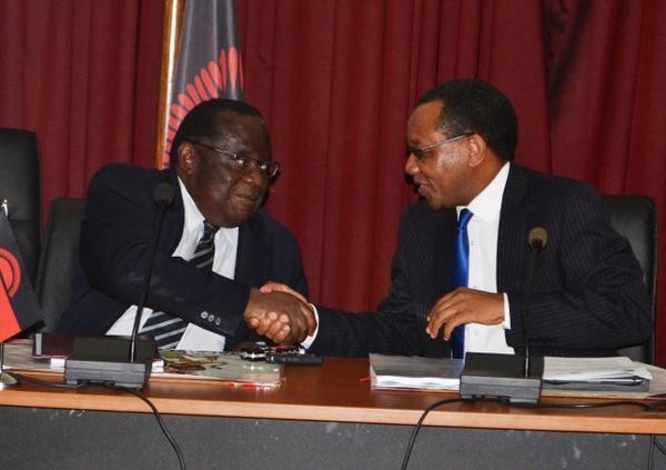Finance Minister Goodall Gondwe congratulate Mpinganjira for Malawi Savings Bnak takeover