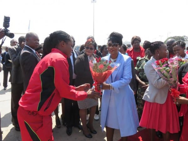 First Lady greets one of the players