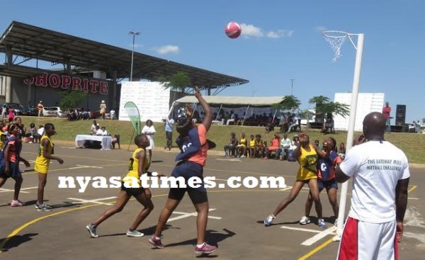 First action on the court was betw een Lilongwe Powers and Dowa Police (yellow)