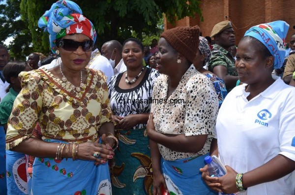 First Lady  refunds Aids money