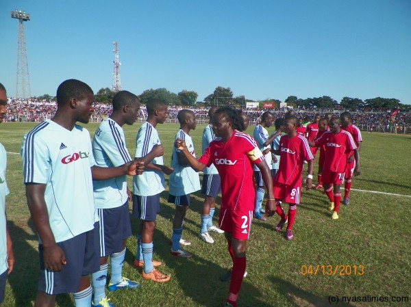 Fischer greets Silver players before the Saturday match