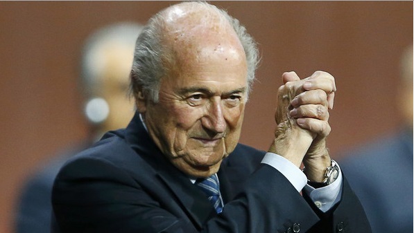FIFA President Sepp Blatter gestures after he was re-elected at the 65th FIFA Congress