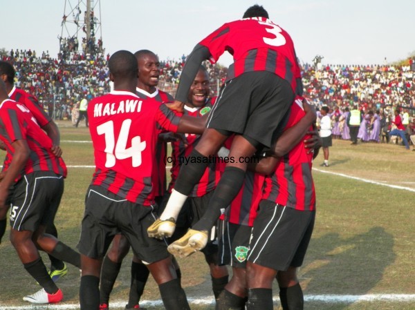 Flames celebrate their goal