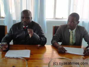 Football Association of Malawi CEO Sugzo Nyirenda  (left) signed agreement...Photo Jeromy Kadewere