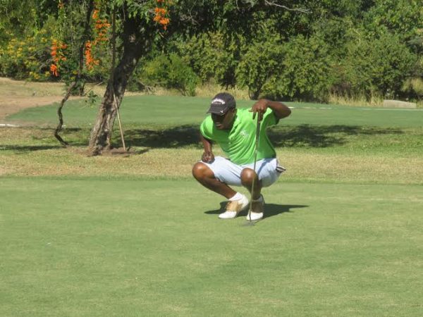 Former Kasasa captain Dan Mvula strategises before patting into the last hole