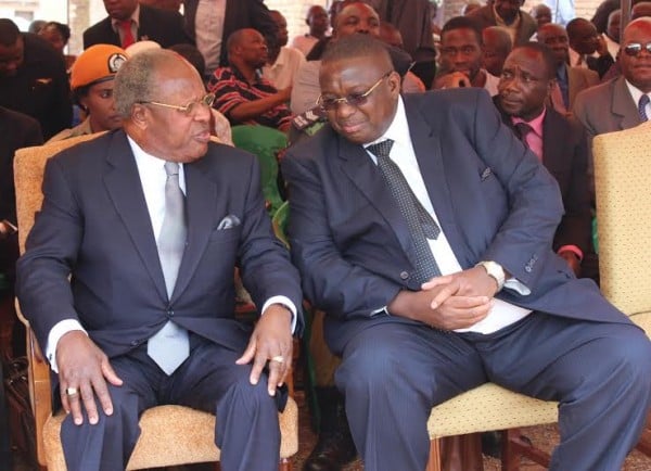 Former President Bakili Muluzi talks to former vice president Khumbo Kachali ...Photo Jeromy Kadewere