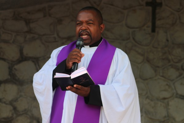 Fr George Kaliati, the parish priest of St Pius led the way of the cross...Photo Jeromy Kadewere