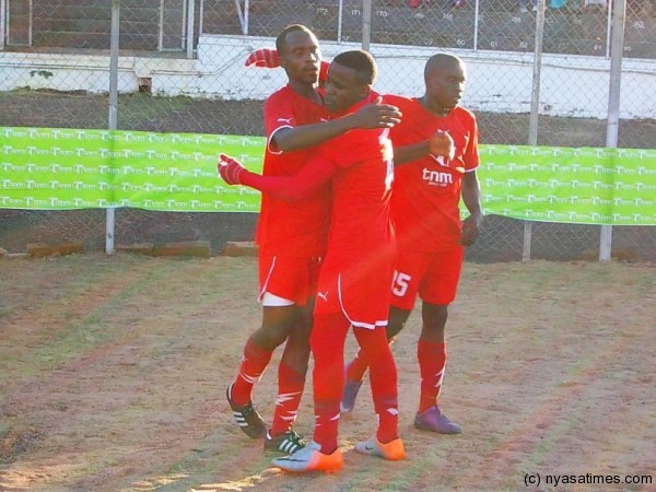 Gabadihno, Chimango Kayira and Lawson Chilewe celebrating the third goal....Photo Jeromy Kadewere